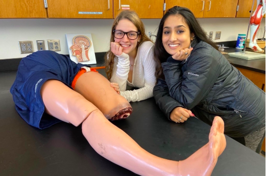 Seniors Mallory Leonard and Sarina Patel work with dummy thighs and learn how to efficiently stop bleeding. "It is important to know what we can do as a society to prevent a death before medical help arrives. "The amount of time it takes for an ambulance or help to arrive isn’t always short enough to get the victim before they bleed out, and if we can prevent a death from happening before help arrives, we could be able to save so many lives," Leonard said.