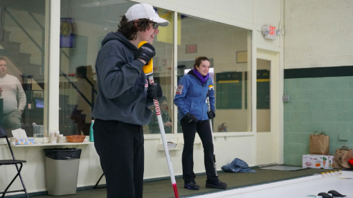 Hebert and Tschumakow smile during their practice. They are holding the brooms as they had just finished their turn. “Weve practiced and worked on building processes for everything. Stick to the plan and remember your processes,” Benton said. 
