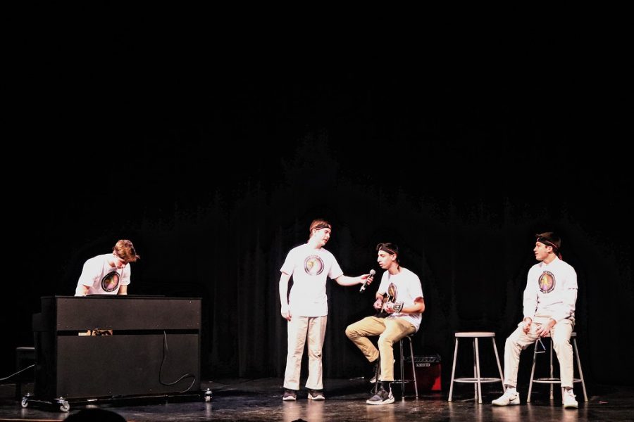 Seniors Josh Snyder, Harrison Veal, Rob Glazer and Michael Wegerbauer wrap up the talent show in their performance of Bohemian Rhapsody by Queen. “We all initially took [the class] because we all needed to fill our fine arts [credit] requirement,” Glazer said. “But, soon we found the class to be really fun so we started meeting up after school and eventually thought about playing in the talent show.”