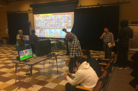 Participants of the video gaming event held during second block last Friday battle each other in a game called Super Mario Smash Brothers. “I hope [students] have fun playing Smash,” event organizer Erik Swanke said. “Maybe we’ll get more people for the club.”