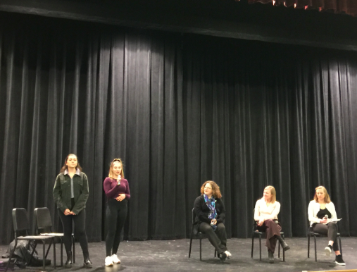 Juniors Maya Baranovsky and Zoe Sodickson present the members of the Winter Week women's empowerment panel. The panel was one of two events organized by Baranovsky and Sodickson to commemorate the 100th anniversary of the passage of the 19th Amendment. 