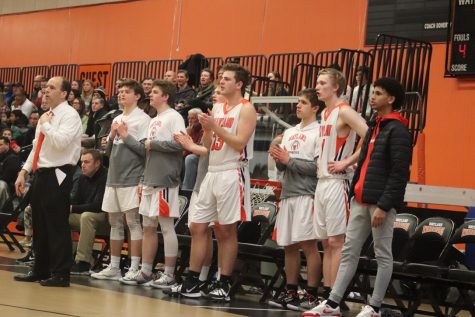 Highlights: Boys varsity basketball cruises to 63-46 victory over Hopkinton Hillers (video)