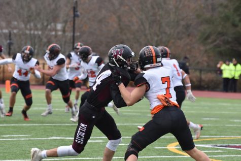 Senior Timmy Goodfellow is shedding off a receiver to look and make a tackle. Wayland and Weston football are known for playing their yearly rivalry game on Thanksgiving. “This past fall we played our 85th annual Thanksgiving Day Football game,” Weston Athletic Director Michael McGrath said.