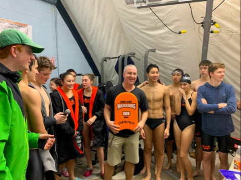 The swim and dive team celebrates Coach Mike Foley's 500th win. This year the boy's team hit many milestones including Foley's 500th win, a fourth consecutive undefeated season and a fourth consecutive state championship win. “I think that we are a family and that we’re willing to fight for each other,” senior captain Jack Brown said. “We’re willing to hurt for each other. We’re willing to push that extra bit for each other that other teams might not be able to push.”
