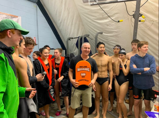 The swim and dive team celebrates Coach Mike Foleys 500th win. This year the boys team hit many milestones including Foleys 500th win, a fourth consecutive undefeated season and a fourth consecutive state championship win. “I think that we are a family and that we’re willing to fight for each other,” senior captain Jack Brown said. “We’re willing to hurt for each other. We’re willing to push that extra bit for each other that other teams might not be able to push.”
