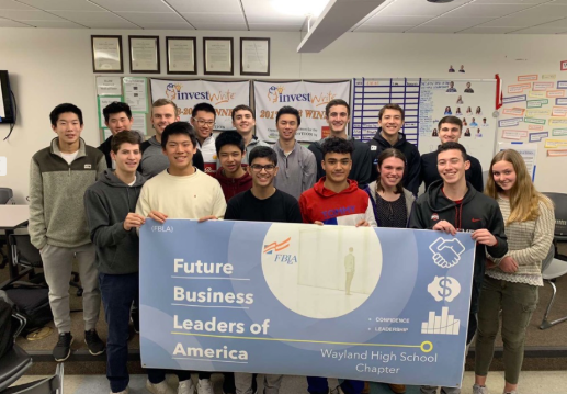 The members of the FBLA club pose for a picture prior to a meeting. In the past, [the club] has been focused on economics, junior Sashwat Das said. But this year we have decided to focus it on entrepreneurship and business and how to go from an idea to a small business and continue to expand that business.