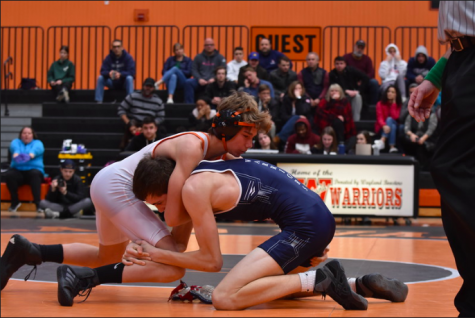 Sophomore Finn O'Driscoll wrestles a Lincoln-Sudbury wrestler. O'Driscoll, among others, gained a close relationship with former athletic trainer Chris Morash.