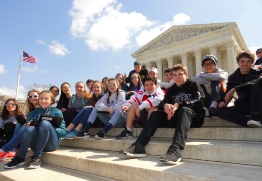 Members of the class of 2022 gather for a picture outside of the Lincoln Memorial at their D.C. trip. This year, eighth graders will not be going to D.C. due to the Coronavirus. “It was definitely a smart decision to cancel the trip considering we are in a pandemic, junior Taylor Travis said. It’s really unfortunate for the kids who aren’t able to go, and I think they should try to reschedule it if that’s possible.”