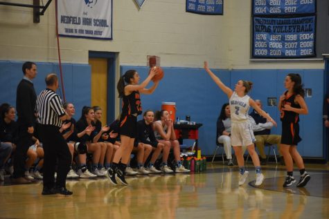 Wayland moves the ball quickly and finds senior Isabella Arenas open for a three-point shot.