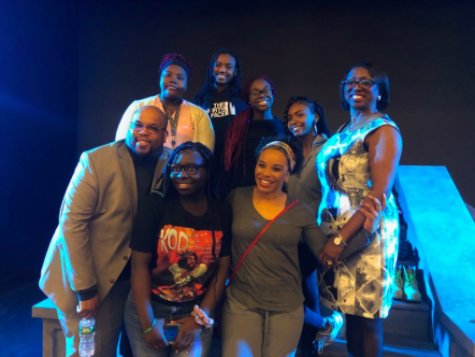 Former METCO director Mabel Reid-Wallace poses with METCO coordinator Mark Liddell, METCO students, and actress Debra Walton following Walton's performance of