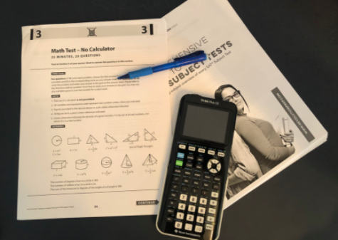 A calculator and pencil rests upon an SAT math practice test. In March, standardized tests began to cancel due to preventing the spread of coronavirus, so some colleges are moving towards becoming test optional.