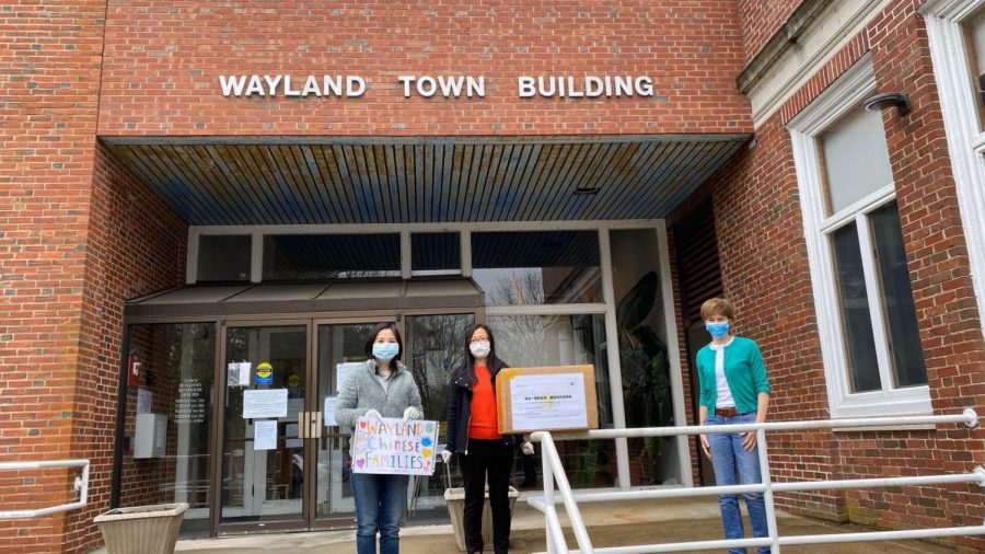 Wayland residents are seen donating masks to Traditions of Wayland Senior Living. The masks were fundraised for by the from the Huanggang High School Alumni Association. “Were all in this together--its not the Chinese vs the rest of the population,” WHS senior Amelia Ao said. 
