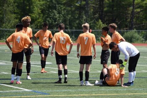The Wayland boys soccer team talks during a preseason game up in Maine. This year's Maine tournament has been cancelled.