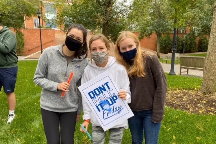 Wayland High School 2020 Graduate Caroline Raymond (middle), stands with some of her friends on campus at Bentley University. “I think our college is handling the Coronavirus very well considering there is only one case,” Raymond said. “The students and staff are very good about following the rules, which really helps.”