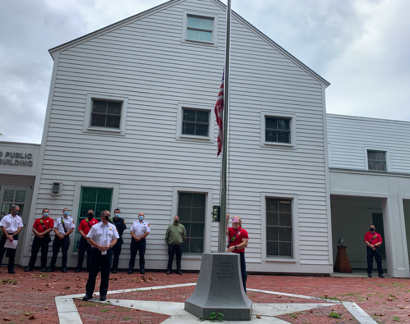 The flag was lowered in honor of the lives lost during the 9/11 attacks. They rang the bell after a moment of silence in remembrance as well. 