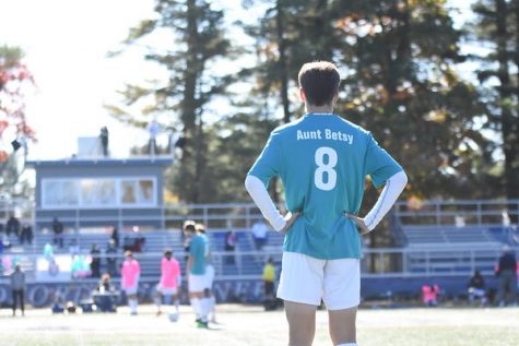 Junior Garrett Spooner waits for ref to blow his whistle, signaling the start of the game.