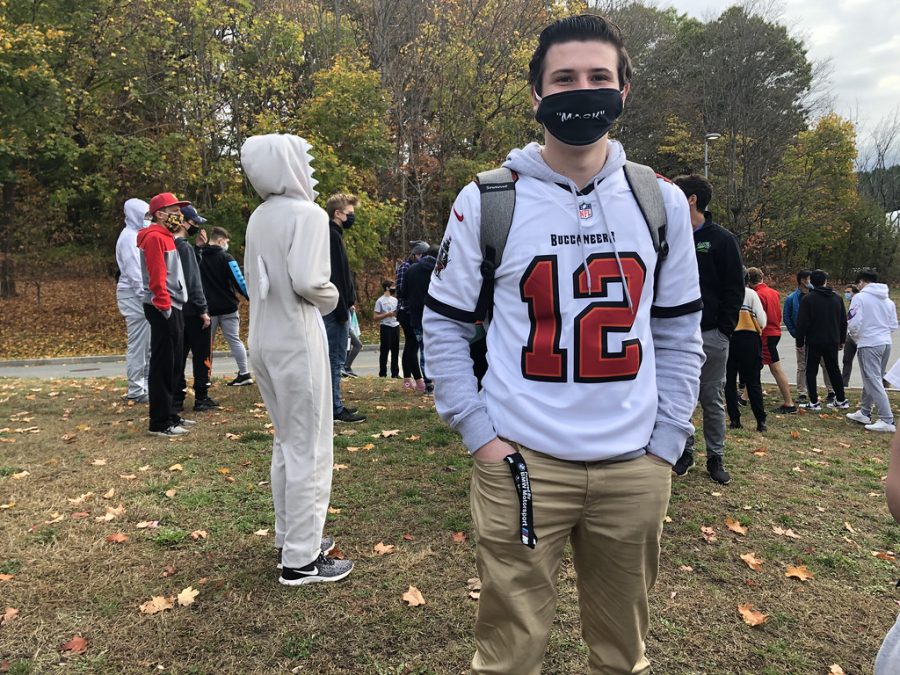 Senior Sam White poses outside dressed as Tom Brady. White is an avid Brady fan, still watching all of his games even though he is playing for the Tampa Bay Buccaneers.
