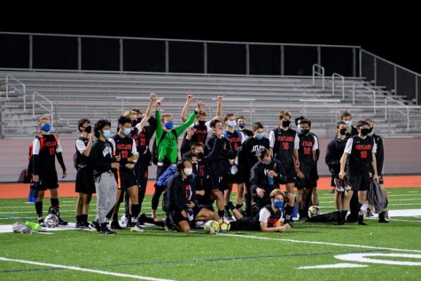 The Wayland boys varsity soccer team poses after the first game of their season. This fall, the team will not be playing in a state tournament as it was cancelled due to COVID-19.