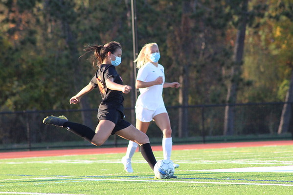 Sophomore center defender Samantha Tyska clears the ball down the field to get it out of Waylands half. Tyska holds the backline together and has taken most of the long kicks for the team this year.