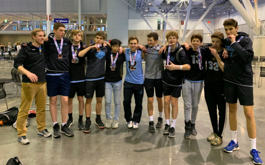 Junior Jake Moser is pictured with his SMASH Volleyball club team at one of their tournaments. He started playing volleyball freshman year and immediately knew he enjoyed all aspects of the sport. 