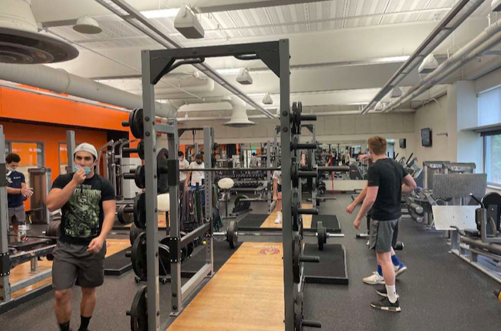 The WHS football team prepares for their upcoming Feb. 22 season start by hitting the fitness room. This year, all Fall II sports will have no postseason due to a recent MIAA decision. Im excited about the [football] season, its inching closer and closer, junior Sean Goodfellow said.