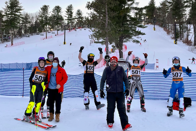 The+Wayland+High+School+boys+alpine+ski+team+stands+at+the+bottom+of+the+mountain+after+finishing+a+race.+This+year%2C+winter+athletes+had+no+real+postseason+due+to+COVID-19.+Although+the+season+was+rough+with+us+being+slowed+down+by+COVID-19+restrictions+and+injuries%2C+we+still+had+a+great+and+successful+season%2C+sophomore+Declan+Murphy+said.
