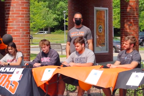 Committed senior athletes celebrate at annual signing day (video)