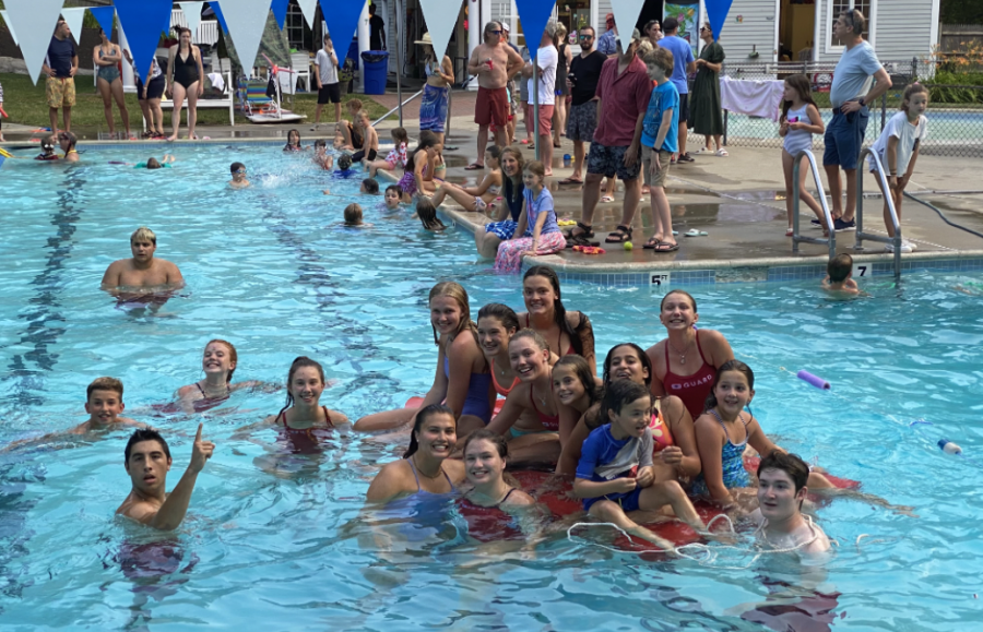 Wayland Swim and Tennis club lifeguards gather in the pool. Many WHS students started working this summer at many different places, including WSTC. Working [at WSTC] just seemed fun and like a good job opportunity, sophomore Sophie Roman said. 