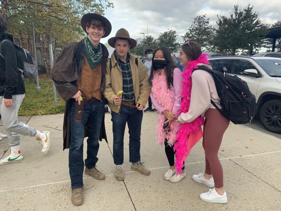 Seniors Elliot Mee and Jack Batts pose as cowboys beside Isabella Donovan and Cassidy Slader. Our favorite part is probably the school-friendly bananas, Mee said.