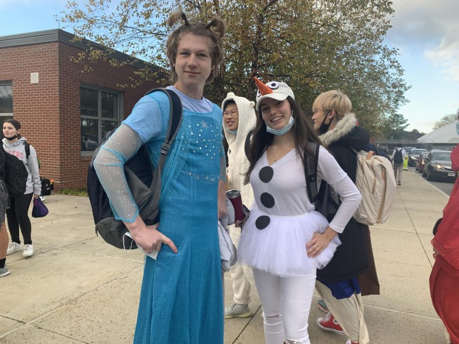 Frozen makes a comeback. Seniors Joe Barenboym (left) and Marie Popov (right) dress up as the beloved Elsa and Olaf.