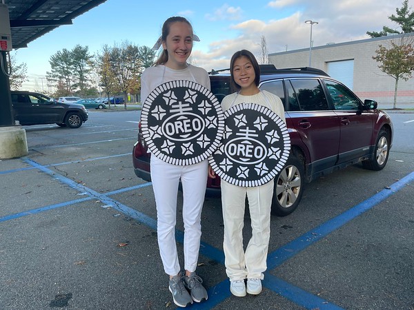 Seniors Silvija Grava and Emily Chau arrive in their matching costumes. Im vegan, and Oreos are the only snack that we share, so we thought it would be fun to dress up as them, Grava said.