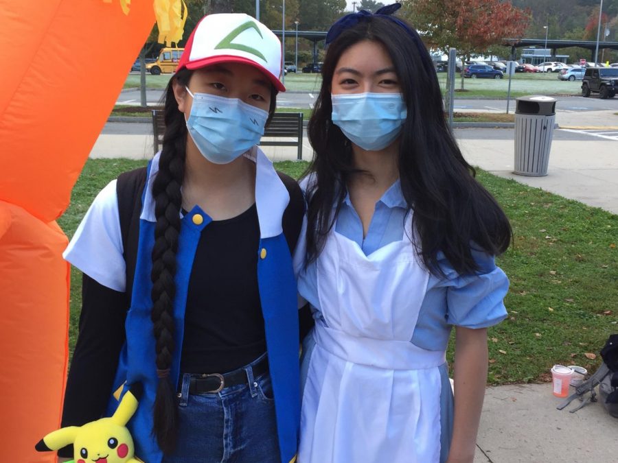 Seniors Ashley Zhu and Isabelle Wang as Ash from Pokemon and Alice from Alice in Wonderland.