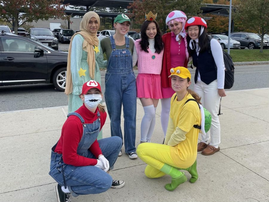 From left to right: Seniors Isabella Batts, Madeeha Syeda, Lily Noyes, Megan Chau, Skylar Gould, Sidney ORourke and Nina Price dress as Mario Kart characters. For seniors halloween is a really special time, so we wanted to do something special, Noyes said.