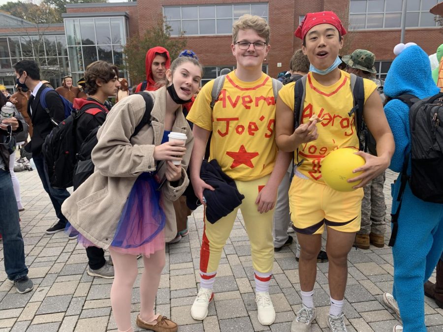Seniors Phoebe Greenaway, James Danforth and Taylor Hsu having a blast at the Monster Mash. Danforth and Hsu dressed up as characters from the movie Dodgeball, and Greenaway dressed up as a ballerina. 