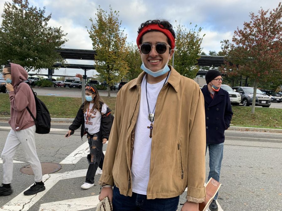 Senior Om Handa walks into school dressed up as Columbian artist Carlos Vives. 