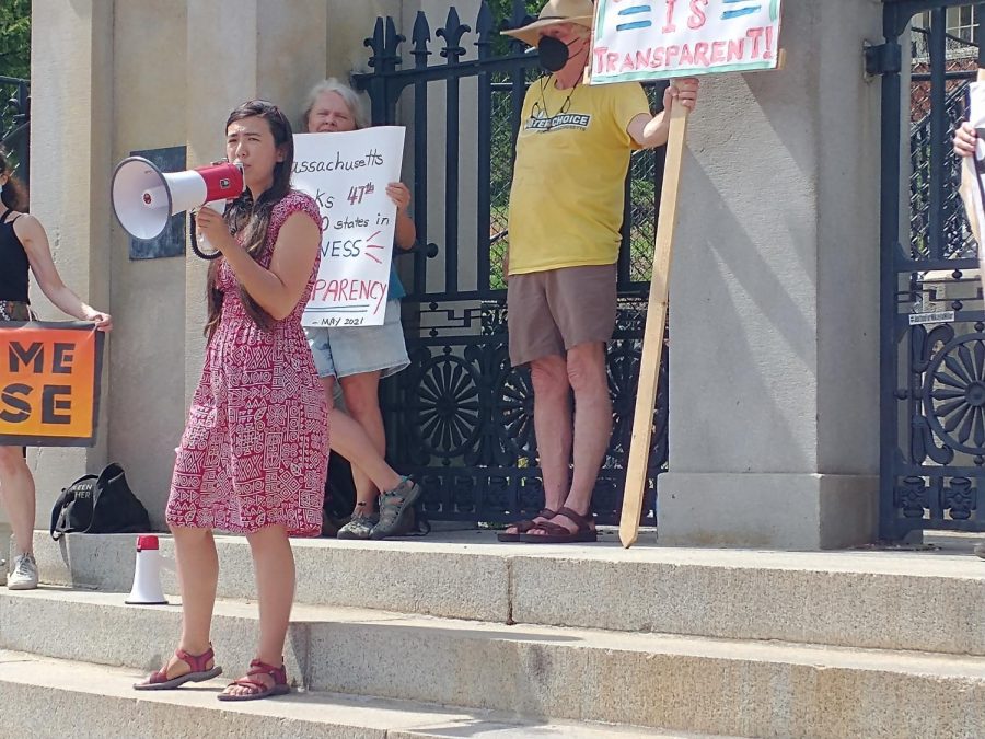 Rep. Erika Uyterhoeven, Wayland High School grad class of 2006, at a rally for state house transparency in June 2021. Uyterhoeven serves in the Massachusetts legislature. Uyterhoeven was inaugurated on Jan. 6 2021. "I firmly believe it's not just about electing me and then i just do whatever I want," Uyterhoeven said. "I work hand in hand with constituents." 

Credit: Joanna Barrow 