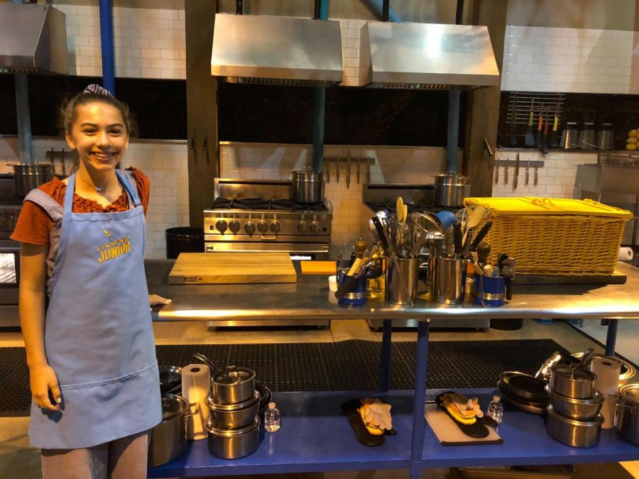 Freshman Maya Noyes beams at the camera as she stands next to her “Chopped Junior” work station. In 2019, Noyes competed on the popular Food Network show, “Chopped Junior,” in which she was crowned the winner. In addition to competing on “Chopped Junior,” Noyes has vast culinary experience since she was only five or six years old. “[My family and I] would watch a ton of cooking shows, like with my parents and my sister, and we’ve watched “Chopped” since I was five and thats kind of when I’d be like ‘oh [cooking] is really cool,’” Noyes said. “I started helping my parents out cooking dinner, and I probably fell in love with it around five or six [years old].”
