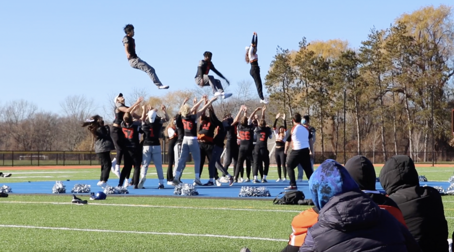 Per tradition, every Spirit Day the cheerleaders invite senior football players to cheer with them. This year, we saw two football players were set as flyers, the ones who are thrown in the air. This is always a student-wide favortie part of Spirit Day