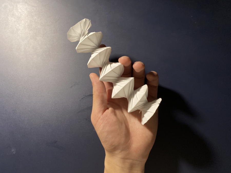 It might not look like it, but that’s all one sheet of paper. After many angular folds, Senior Lucas Pralle finished his spiral tessellation. “Getting the final model was the hardest part,” Pralle said. “But I really enjoy how origami tests my patience.”