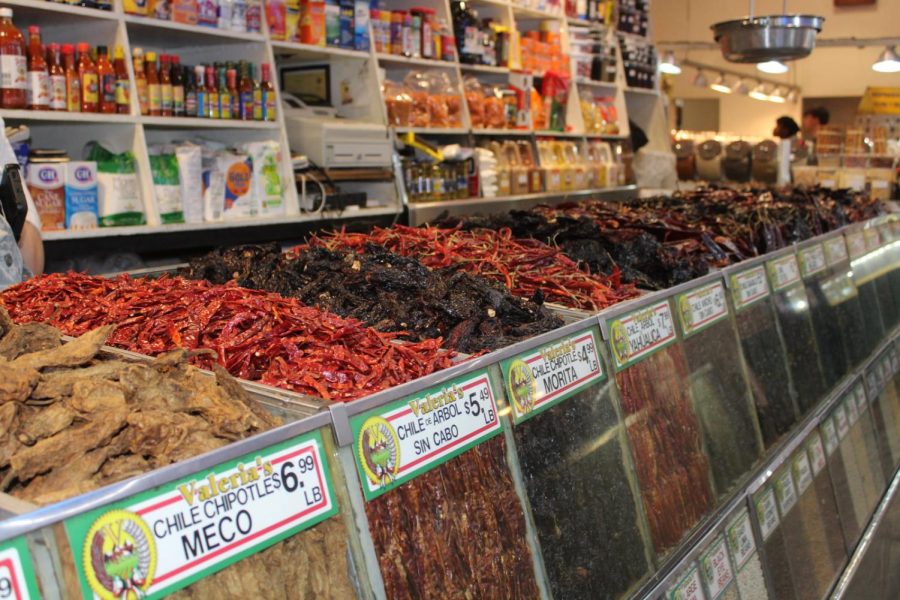 A variety of dried chillies line the front of Valerias, a small Latin vendor. Valerias also offers a selection of spices, beans, nuts, canned goods and more.