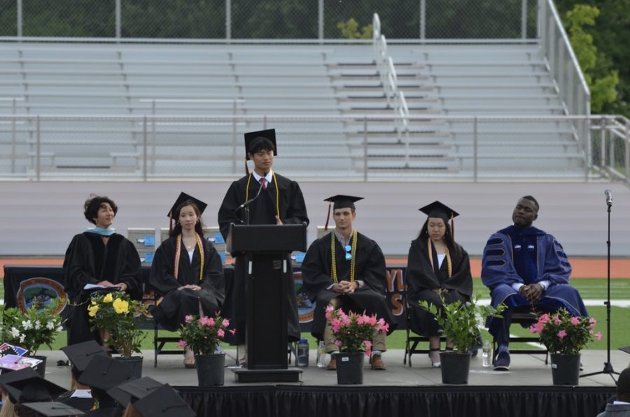 Senior class president Andrew Zhao makes a welcoming speech at the beginning of the ceremony. Zhao was class of 2022 president for all four years of high school.