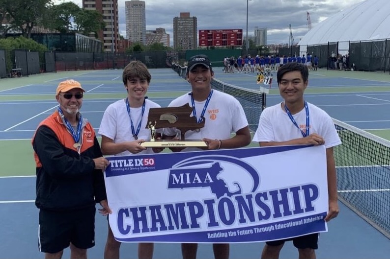 The Wayland boys varsity tennis team wins the MIAA state championship game against Bedford. The team won the match 3-2. 