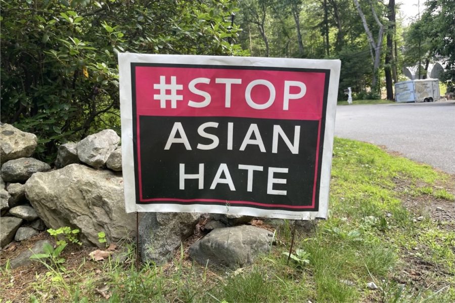 Stop Asian Hate signs rest on lawns across Wayland and surrounding towns. “I designed the signs, I had them produced by a company and then I distributed them,” Wayland resident Jun Wan said. “I sent the news out, and people came by and picked it up from my yard. Suddenly, they were all gone, and now I see them all over [Wayland].”