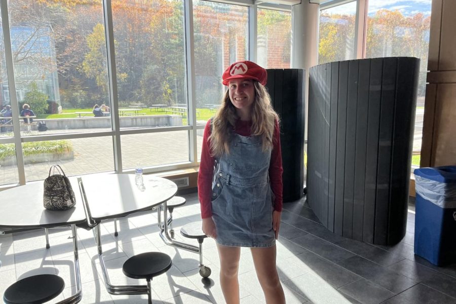 Senior Alex McQuilkin as Mario. She paired an overall dress with a red shirt underneath for a convenient costume.