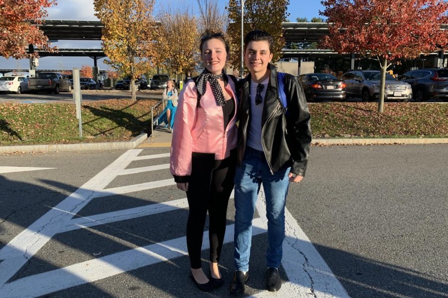 Seniors Molly Morneweck and Zach Todd dress up as a Pink Lady and a T-Bird. Our inspiration for this costume was Grease, Morneweck said.