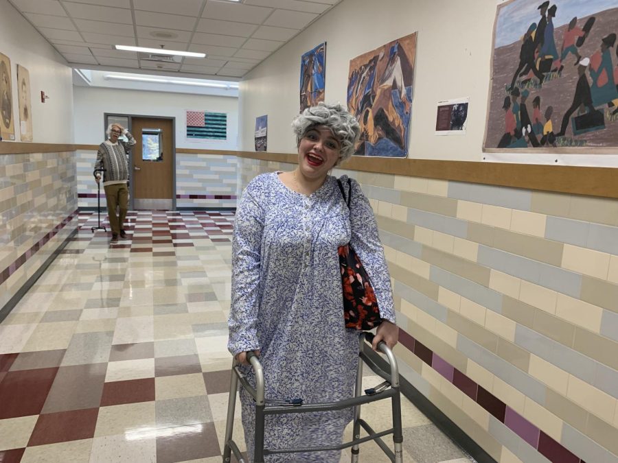 Senior Charlotte Dudau dresses as an old lady. Her group won the Class of 2023 costume contest.