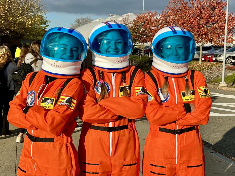 Seniors (left to right)Emily Roberge, Sophia Oppenheim and Charlotte Richter show off their astronaut costumes. The three of us were like, We should do a costume together for Halloween, Oppenheim said. Even though there was a lot of debating on what we should be, we finally decided [on astronauts].