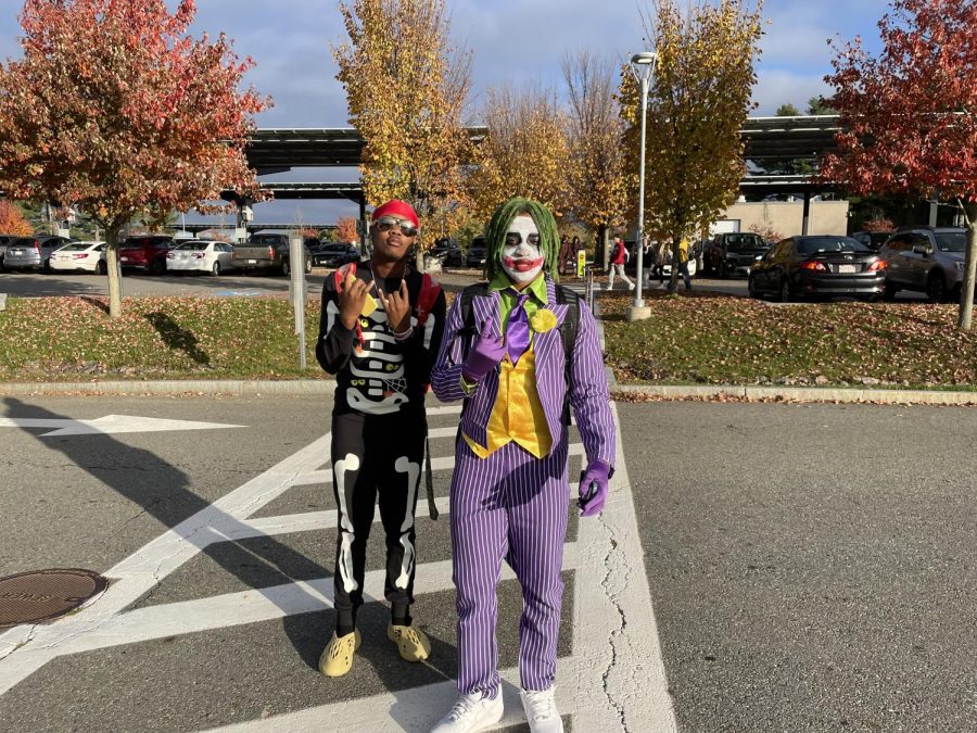 Seniors Malachi Dixon-Loatman and Al Young pose in their Joker and skeleton costumes. Its our senior year and we had never dressed up for [Halloween at school], Young said. We wanted to dress up for our last year.