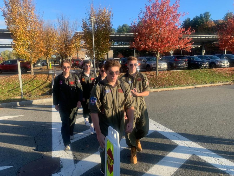 From left to right, Eli Sodickson, Austin Russell, Zach Greenberg, Ethan Brandeleone and Jake Zocco, strut down the crosswalk dressed as the Top Gun crew.