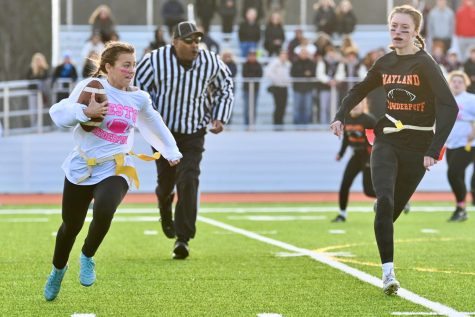 Senior Lila Powers eyes her Weston opponent. Many of the powderpuff players are athletes. Powers is a co-captain of the girls varsity basketball team.